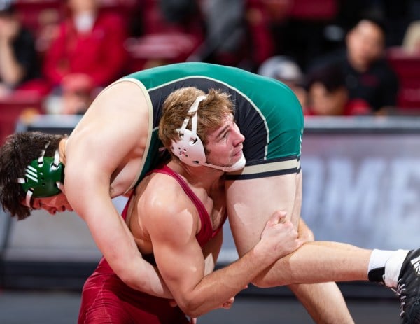 Redshirt junior Nathan Traxler (above) contributed to the Cardinal's upset win over No. 17 University of North Carolina by pinning his opponent in only 56 seconds (JOHN P. LOZANO/isiphotos.com).