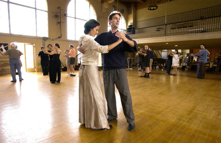 Waltz Week. Dance lecturer Richard Powers demonstrates with Instructor Angela Amarillas.
Credit: Linda A. Cicero / Stanford News Service 
Waltz Week, Summer 2002