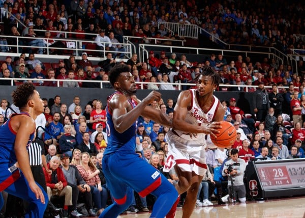 Junior guard Daejon Davis led men's hoops in points, rebounds and assists in a runaway win over rival Cal to open conference play. (Photo: BOB DREBIN / isiphotos.com)