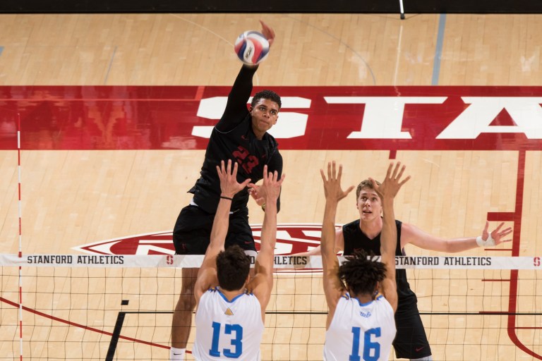 Junior opposite Jaylen Jasper (left) recorded 24 kills and senior outside hitter Eric Beatty (right) put away 15 more, but the Cardinal could not down St. Francis. After losing the first two sets, the Red Flash won the next three to complete the reverse sweep. (MIKE RASAY/isiphotos.com)