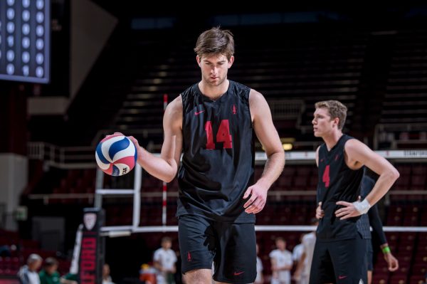 Contributing to all six of Stanford's blocks, junior middle Kyler Presho (above, center) was one of the few bright spots in Stanford's loss to BYU. Senior outside Eric Beatty (above, right) almost managed to spark a third-set comeback with three aces in four serves. (Photo: KAREN AMBROSE HICKEY/isiphotos.com)