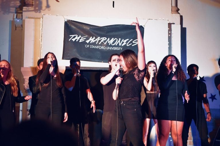 Suah Cho '22 rallies the Harmonics during their a cappella rendition of Bishop Brigg's "White Flag" (photo credit: Tom Ramlan)