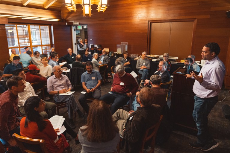 Steering Committee member Adam Banks briefs the Faculty Senate at its Thursday meeting. (Photo: ANDREW BROADHEAD / Stanford News Service)