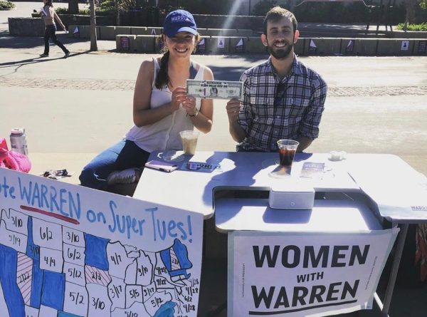 Chloe Stoddard '21 and Bryce Tuttle '20 table for Elizabeth Warren. (Photo courtesy of Chloe Stoddard)