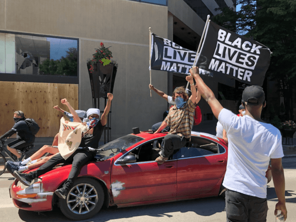 One of the cars that rode alongside the march during Sunday afternoon’s demonstration in Columbus, Ohio. (Photo: LANA TLEIMAT/The Stanford Daily)