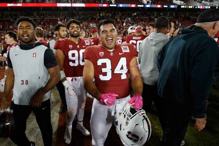 Houston Heimuli (34 above) is entering his senior season after recording three catches last year. As a junior he appeared in all 12 games and started three, despite most colleges using fullbacks less and less. (Photo: BOB DREBIN/isiphotos.com)