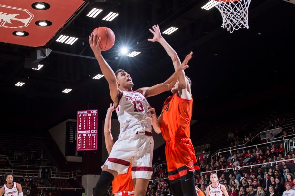 Oscar da Silva is known around campus not only for his dominance on the court, but his academic prowess, which includes stem cell research.(Photo: KAREN AMBROSE HICKEY)