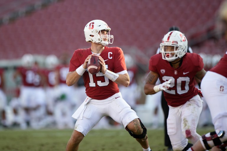 Senior quarterback Davis Mills (above, center) looks to lead the Cardinal to the first win of the season on Friday, and bring the Axe back to the Farm in the process. (Photo: BOB DREBIN/isiphotos.com)