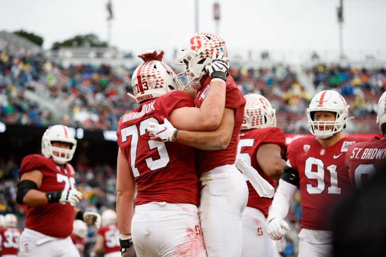 Sophomore guard Jake Hornibrook (above, left) and junior wide receiver Michael Wilson (above, right) will play key roles for the Cardinal in this unprecedented season. (Photo: BOB DREBIN/isiphotos.com)