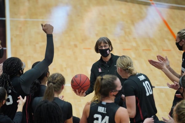 Head coach Tara VanDerveer (center) celebrates her record-setting win on Tuesday night. (Photo courtesy of Stanford Athletics)