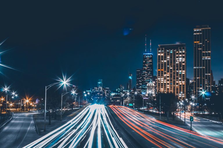 Pictured: a blurred city street at night.