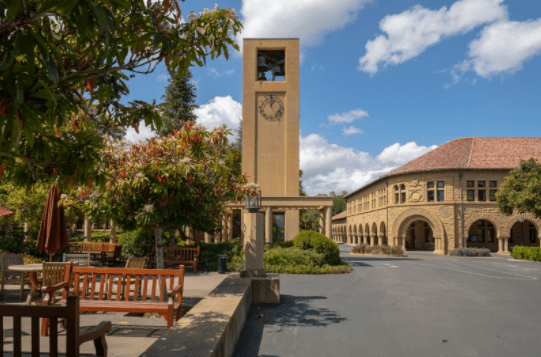 Stanford Clock Tower next to benches.