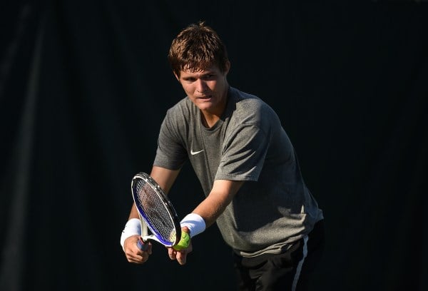 Junior Alexandre Rotsaert (above) snagged the clinching point in Stanford's 4-0 shutout victory over LSU on Saturday. The win sends Stanford to a second-round matchup on Sunday at 9 a.m. PT. (Photo: CODY GLENN/isiphotos.com)