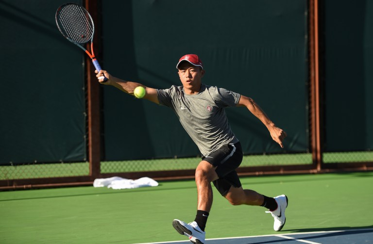 Senior Timothy Sah (above) and freshman Tristan Boyer posted a 6-4 doubles victory to help Stanford earn the doubles point against No. 5 Virginia on Sunday. Singles play was dominated by the Cavaliers, and the Cardinal ultimately fell 4-2 (Photo: CODY GLENN/isiphotos.com)