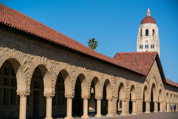 Photo of main quad with Hoover Tower in the background and a sunny blue sky