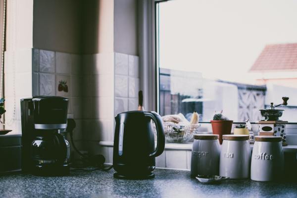 Kitchen countertop items including a coffee maker