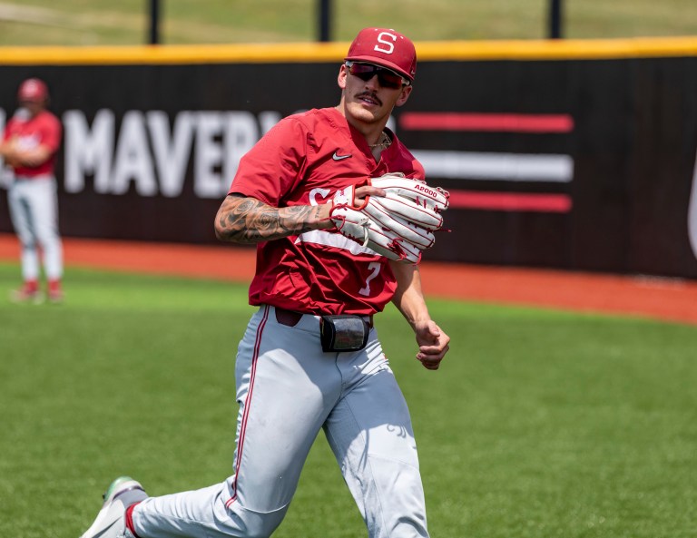 Brock Jones running to catch a ball