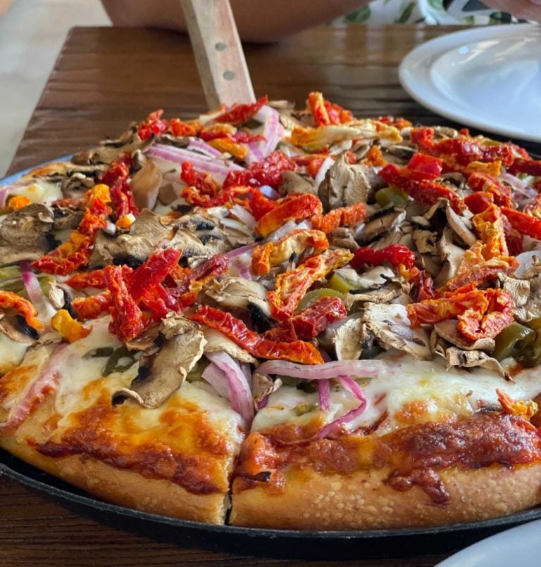 Pizza served on a restaurant table