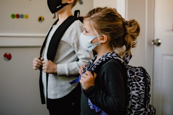 Young students wearing masks