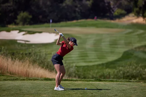 Senior Aline Krauter tees off on a par three.