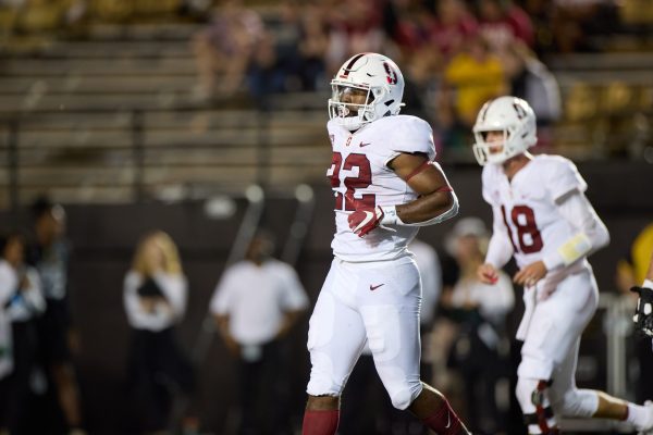 E.J. Smith jogs onto the field.