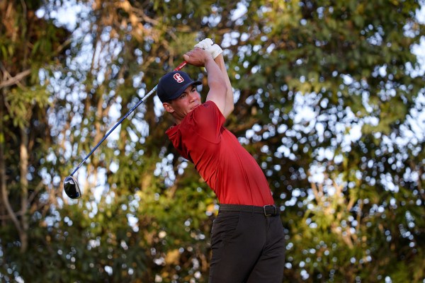 Sophomore Michael Thorbjornsen watches his tee shot intently.