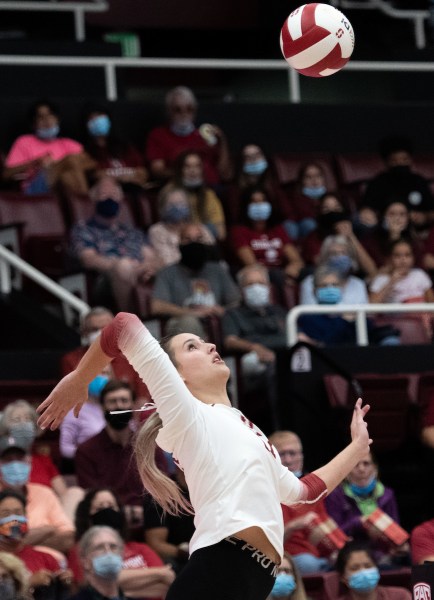 Freshman outside hitter Sami Francis winds up for a spike.