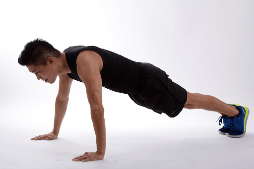 A man performs pushups