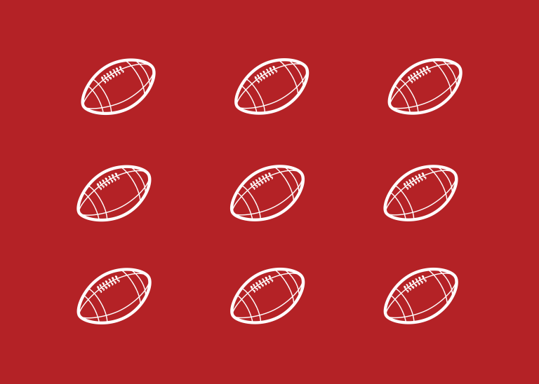 White footballs against red backdrop