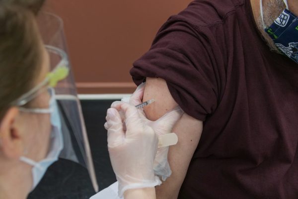 Patient receiving COVID-19 vaccine.