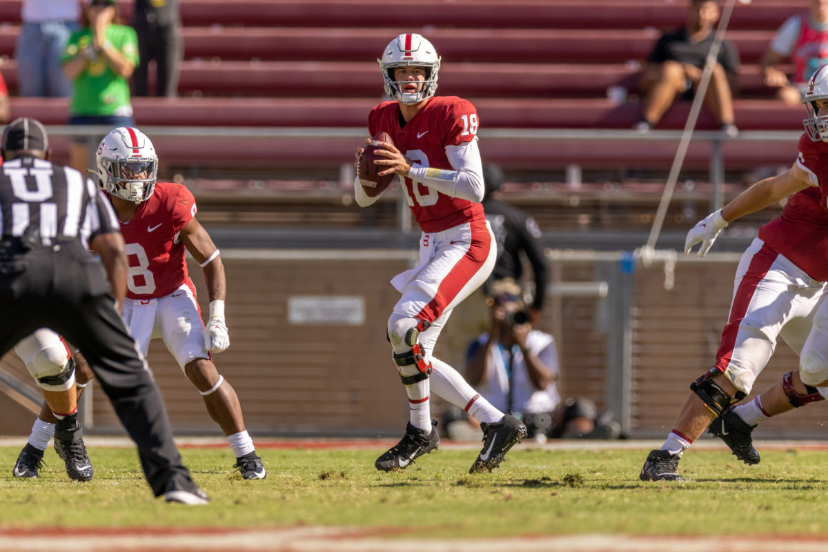 Sophomore quarterback Tanner McKee looks out in the distance with ball in hand.