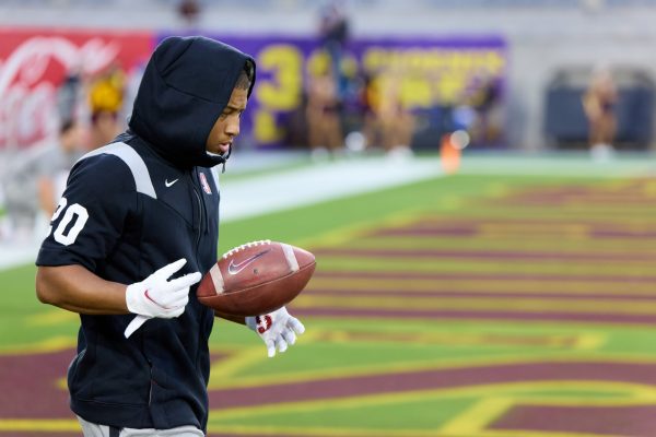 Austin Jones #20 of the Stanford Cardinal warms up before a game between Arizona State University and Stanford Football at Sun Devil Stadium