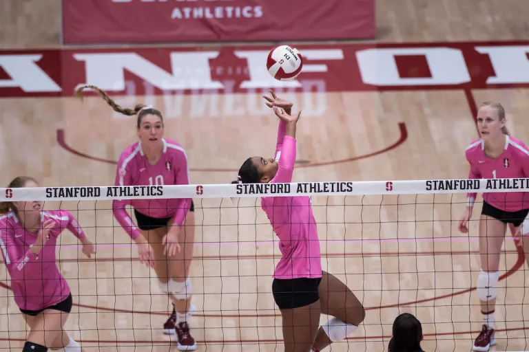 Freshman setter Kami Miner executes a back set.