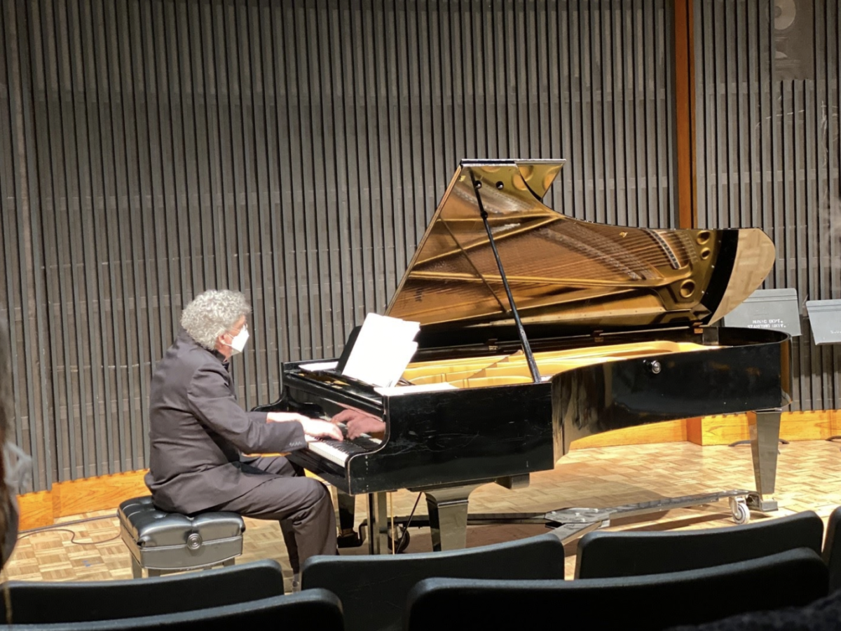 Schultz playing the piano.