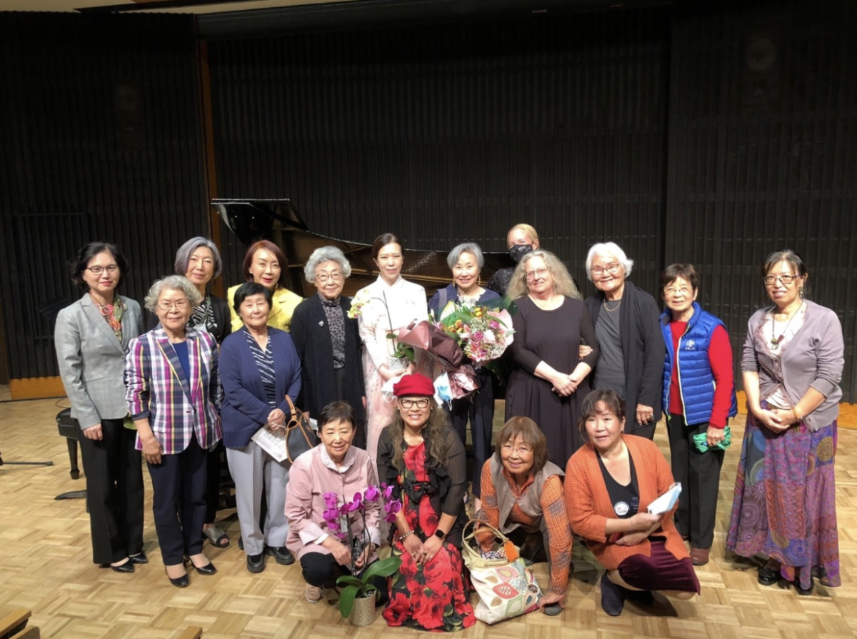 The Wooden Fish Ensemble posing for a group photo.