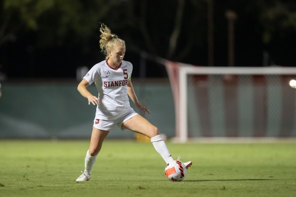 Sierra Enge dribbles the ball.