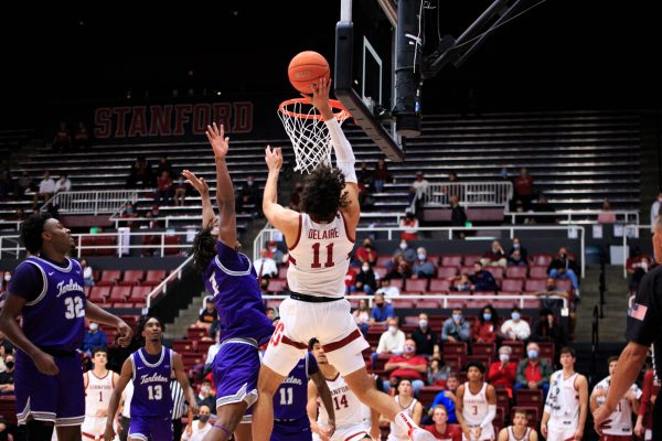 Jaiden Delaire shoots a jump shot against Tarleton State defenders.