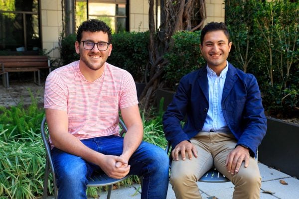 Matt Cullen (left) and Nikhil Shiva sit for a portrait at the Jones Terrace atop the William H. Neukom Building.