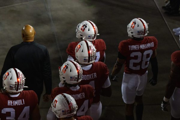 football players exit tunnel pre-game