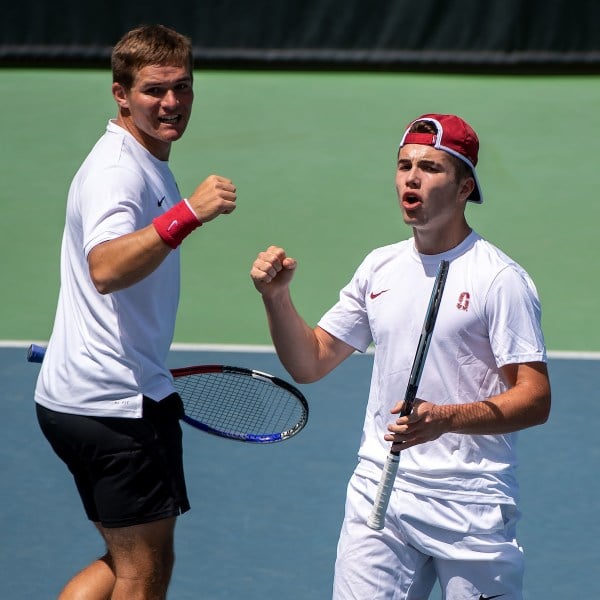 Alexandre Rotsaert and Arthur Fery celebrate following a point.