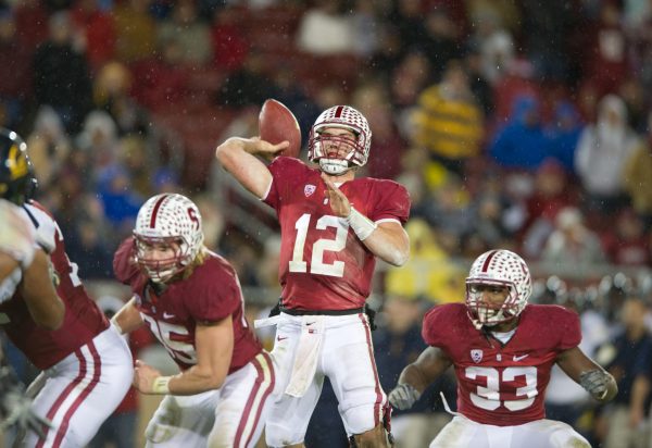 A photo of Andrew Luck throwing a football in game