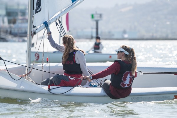 Michelle Lahrkamp and Aston Borcherding sit on their boat.