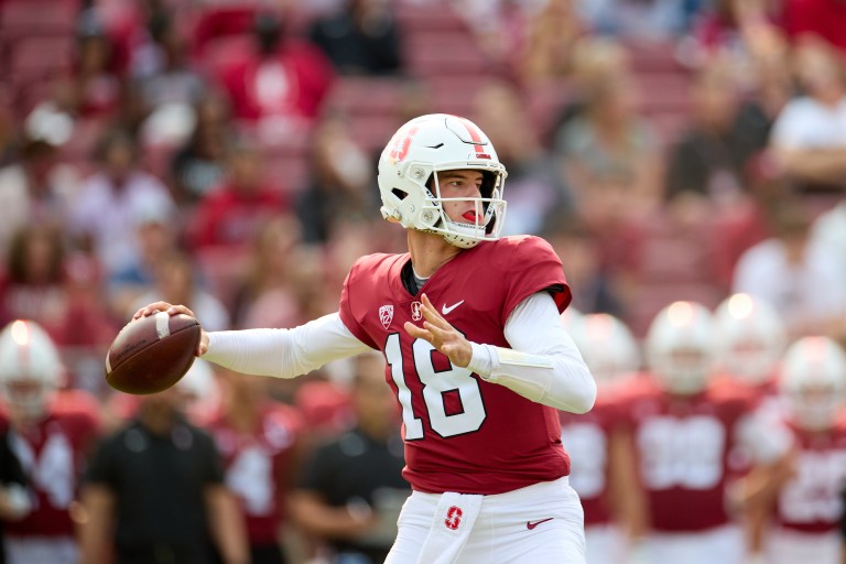 Quarterback Tanner McKee throws a pass