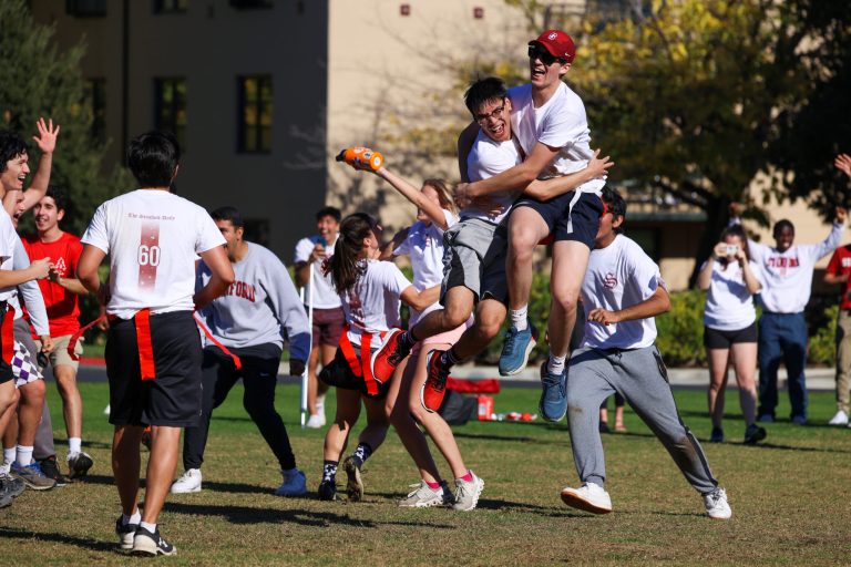 Ink Bowl players jump in celebration following The Stanford Daily's defeat of The Daily Californian.