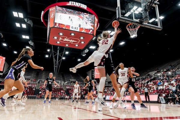 Sophomore forward Cameron Brink rises above a defender for a layup.