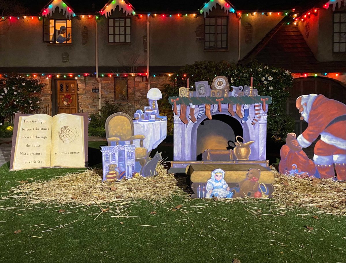 A holiday decoration display on the front lawn of a Palo Alto home.