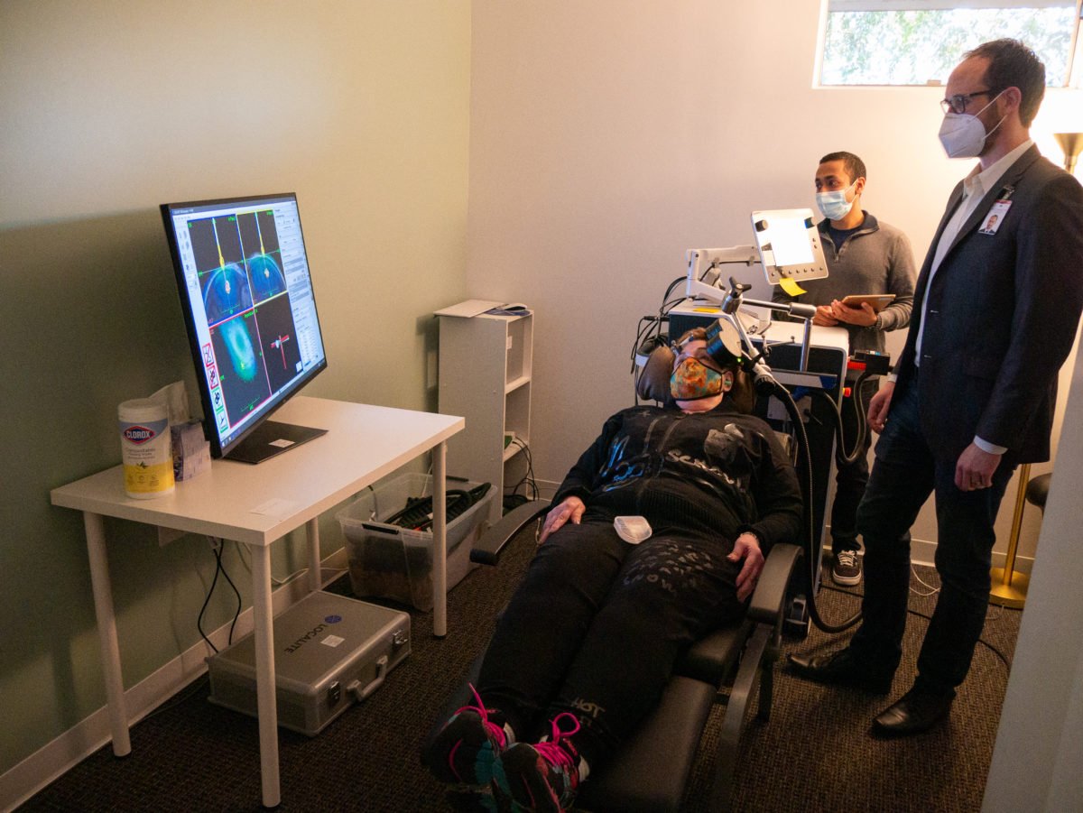 Patient receives treatment in chair