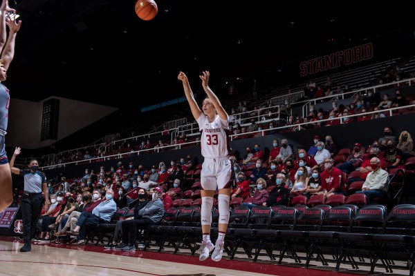 Junior guard Hannah Jump shoots a three-pointer from the corner.