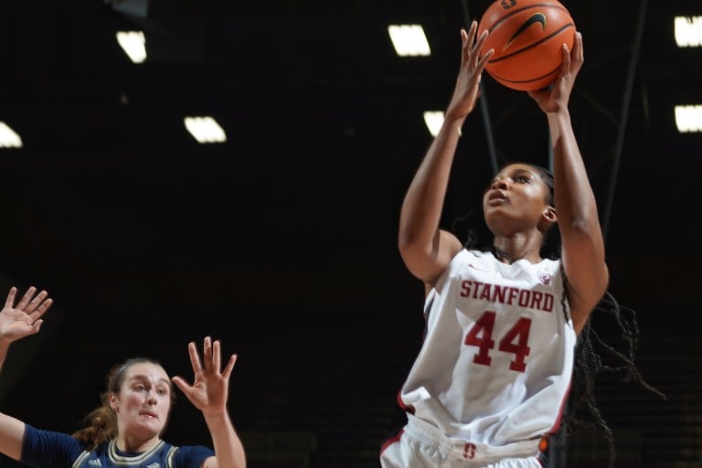 Freshman forward Kiki Iriafen rises for a layup.