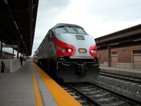 A train arrives at a station.